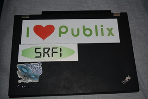 My laptop, with Publix and SRFI stickers.
